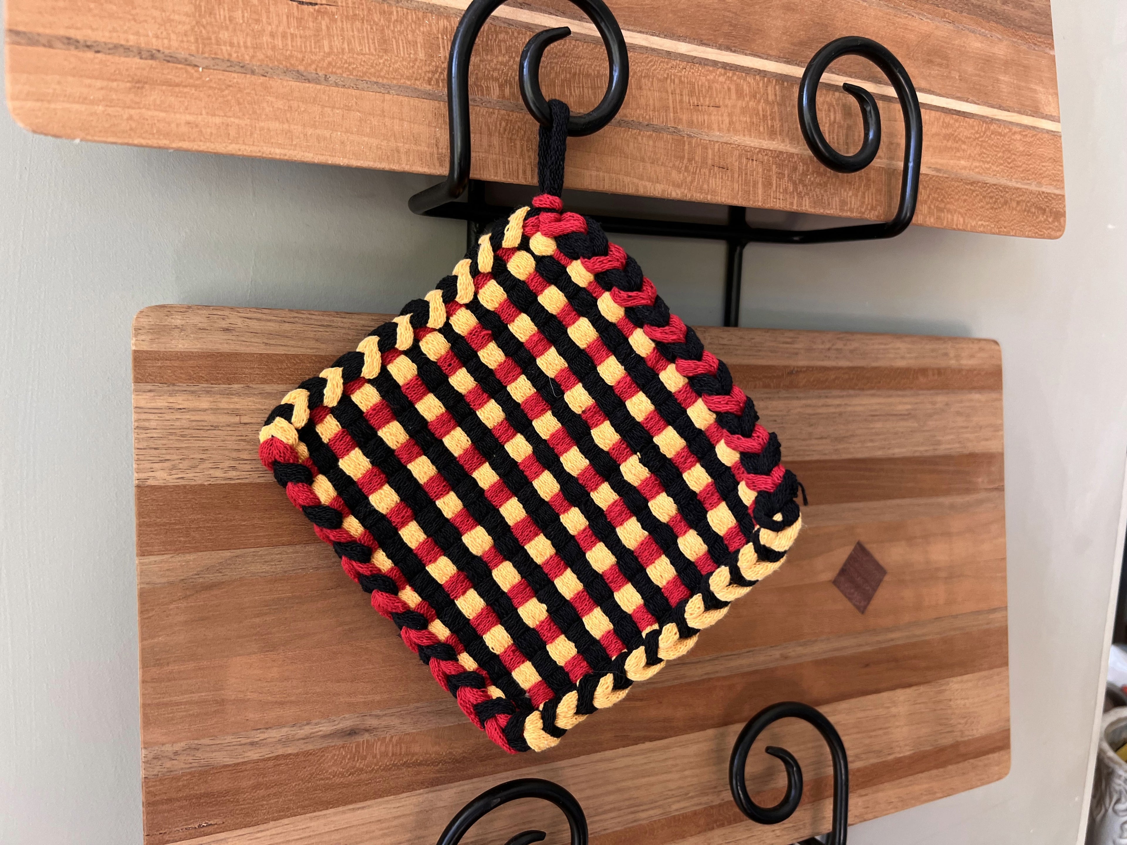 Handmade Loom Potholder – Bold Black with Red & Yellow Accents